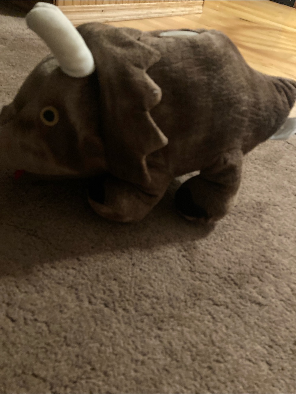 Rino kids coin bank soft with bottom opening.
